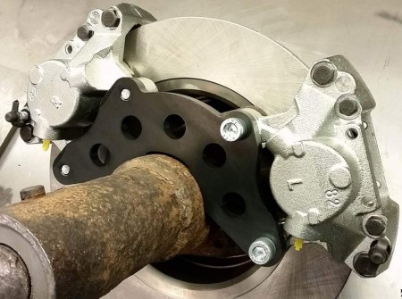 Volvo 240 Motorsport double caliper adapters.