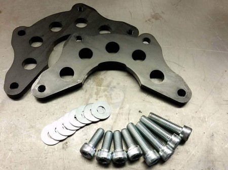 Volvo 240 Motorsport double caliper adapters.